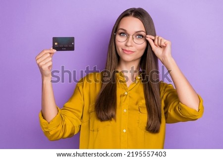 Photo of hr brown hair lady hold card wear eyewear brown shirt isolated on purple color background