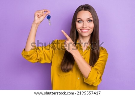 Photo of funny brown hair lady index key wear blouse isolated on violet color background