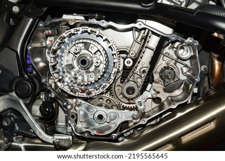 1100 CC motorcycle engine, clutch, synth and gears Royalty-Free Stock Photo #2195565645