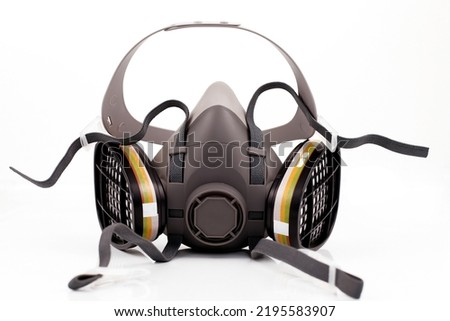 Reusable half-face elastomeric respirator for air purification with replaceable filters on a white background
 Royalty-Free Stock Photo #2195583907
