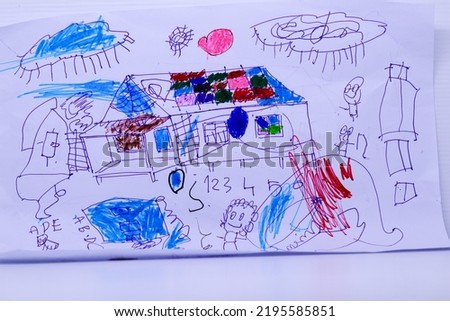 the work of drawing a four year old child, there are houses, people, numbers 1 2 3 4 5 6 and the ABCDE alphabet