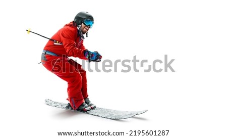 Skiing sport. Side view. Sportsman in a red ski suit. Sport emotion. Isolated. In action