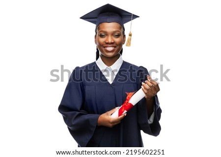 education, graduation and people concept - happy graduate student woman in mortarboard and bachelor gown with diploma Royalty-Free Stock Photo #2195602251