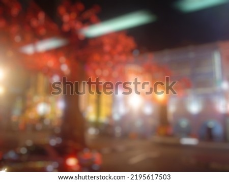 Blur photo of urban city light at night in Singapore, beautiful colorful night lights.
