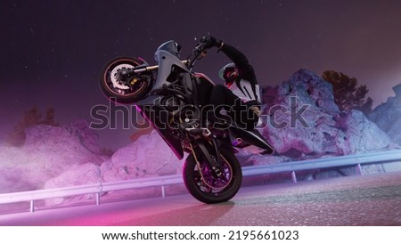 Moto rider making a stunt on his motorbike. Motorcycle stunt riding. Royalty-Free Stock Photo #2195661023