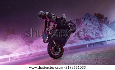 Moto rider making a stunt on his motorbike. Motorcycle stunt riding. Royalty-Free Stock Photo #2195661033