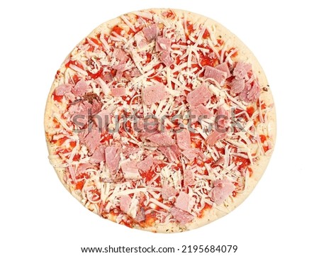 Whole frozen raw round pizza with smoked meat, mozzarella cheese and tomato sauce, 
isolated on white background, close-up, top view