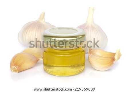 garlic and jar of honey - Stock Image