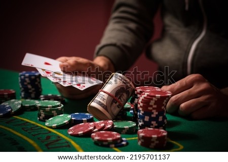 The player makes a bet in poker. Royalty-Free Stock Photo #2195701137