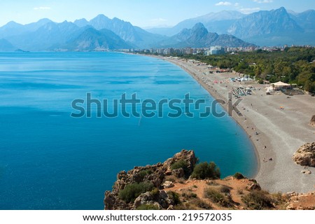 Konyaalti beach, Mediterranean sea with Taurus mountain. Antalya, Turkey Royalty-Free Stock Photo #219572035