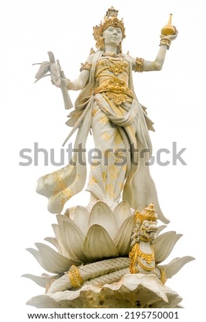 balinese goddess statue in garden premium photo
