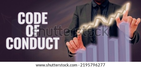 Text sign showing Code Of Conduct. Word for Ethics rules moral codes ethical principles values respect Man In A Suit Showing Crucial Data Charts And Growth In Business.