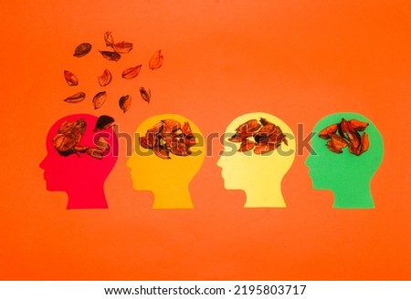 change from summer to autumn through paper head from green to autumn colors, brain of decorative potpourri in red head creative autumn explosion