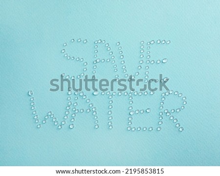 Inscription Save Water made of drops on light blue background, top view
