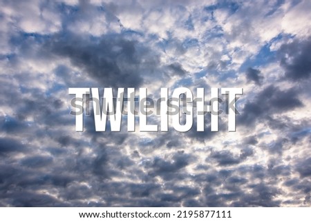 TWILIGHT - word on the background of the sky with clouds.