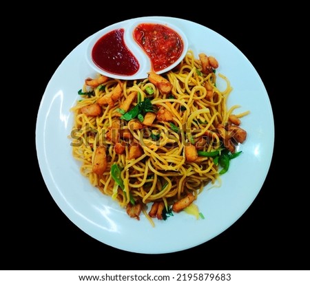 Chicken chowmein on a Plate, Hot and Fresh Chow Mein in Nepali Style, Chinese noodles. Royalty-Free Stock Photo #2195879683