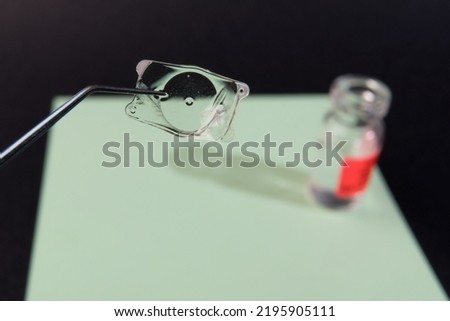 closeup photo of the implantable collamer lens ICL for treating  Royalty-Free Stock Photo #2195905111