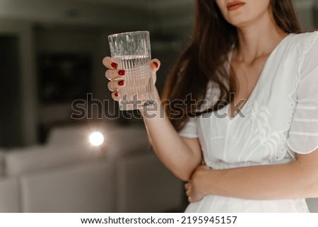 girl drinks water from a glass,healthy lifestyle 