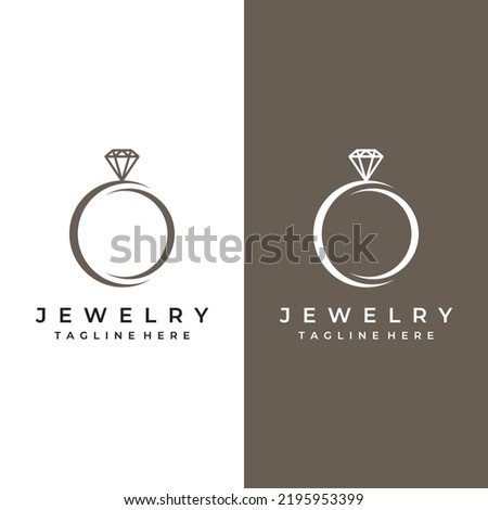 Abstract logo of jewelry ring with luxury diamond or gems.Isolated black and white background.Logo can be for jewelry brand and sign. Royalty-Free Stock Photo #2195953399