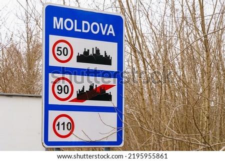 Road sign with speed limit and the inscription Moldova at the state border or customs. Background with selective focus and copy space for text