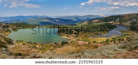 The Neila lagoons are a group of impressive lakes of glacial origin surrounded by peaks of about 2000 meters high, to the south of the Sierra de la Demanda located in the province of Burgos. Royalty-Free Stock Photo #2195965519