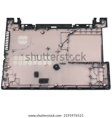 part of the case from a laptop, the bottom cover, a spare part for a laptop, on a white background in isolation