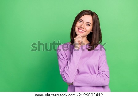 Photo of adorable sweet intelligent lady touch chin thinking solving decisions isolated on green color background