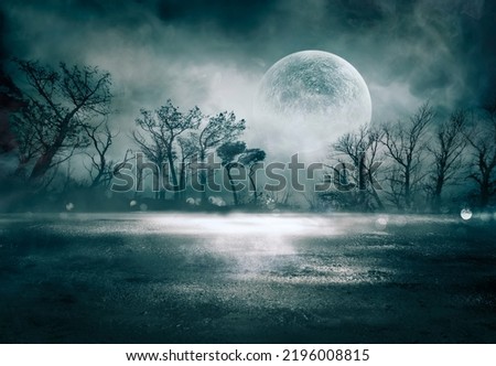 Fog In Spooky Forest At Moon Light On Asphalt - Abstract Bokeh And Filter Toned Royalty-Free Stock Photo #2196008815