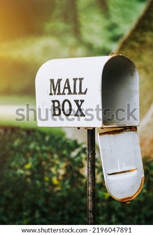 Mail Box in the autumn village. Old Mail Box In Sunset.