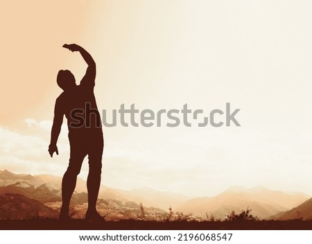 Man Silhouette Take a Selfie on the cliff with blue cloudy sky on Caucasian mountains. Traveler male wear sporty clothes and take pictures with a smartphone on top of rock. summertime season. Jermuk.