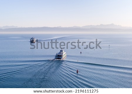 Lake Constance with Alpstein mountain range and Ferry ship