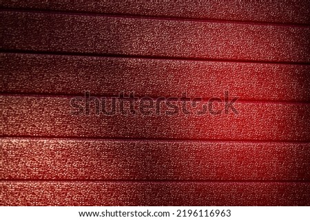 Red material, Intense industrial background.