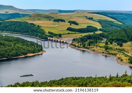 A view from top of Bamford Edge towards the side of Ladybower reservoir, UK in summertime Royalty-Free Stock Photo #2196138119