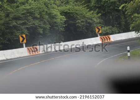 Scenic view on the gravel road with stones and vegetation on roadsides, selective focus. High quality photo