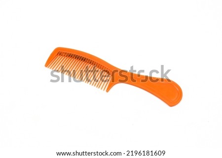 dirty hair comb on white background