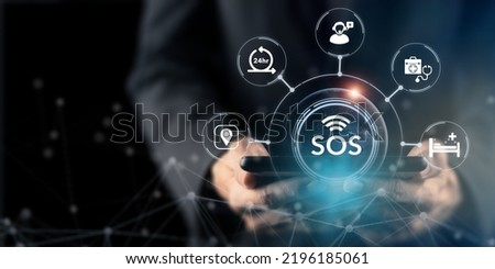 SOS, Health care emergency application. Technology and network concept. Urgency, SOS, warning, emergency kit, ambulance, hospital, rescue and safety. SOS alerts and alarms for the elderly concept. Royalty-Free Stock Photo #2196185061