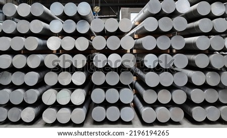 Heap of aluminium bar in aluminum profiles factory.Billets of aluminium Royalty-Free Stock Photo #2196194265