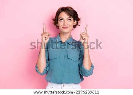 Closeup photo of young adorable pretty attractive cute woman fingers up positive look curious interested promotion ad isolated on pastel pink color background