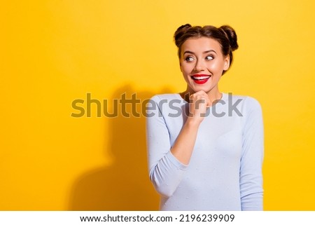 Photo of pretty intelligent young lady look blank space daydreaming generate creative ideas isolated on yellow color background