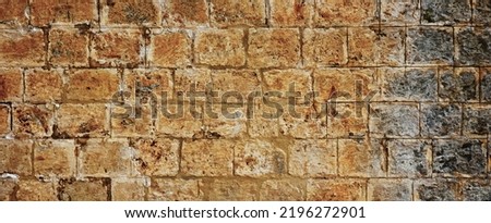 Ancient Greece, Egypt, Rome Wall. Worn Stone laying Old Brickwork Construction Textured Wallpaper Web Banner Interior Decision High Quality Photo