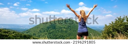 hiker woman in Auvergne,  Puy de Come Royalty-Free Stock Photo #2196291805