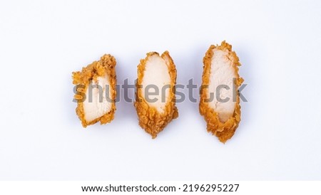 chicken tenders strips cuts in high res. image and isolated in white   Royalty-Free Stock Photo #2196295227