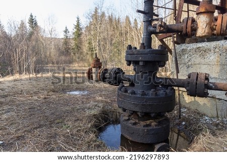Oil rolling pin. An old oil rolling mill on the outskirts of the city of Boryslav, Ukraine. History of oil production.