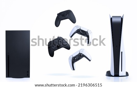 Consoles and game controllers on white background. Royalty-Free Stock Photo #2196306515