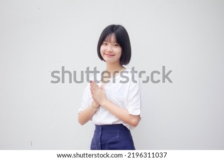 asia thai teen White t-shirt beautiful girl thai Pay respect Royalty-Free Stock Photo #2196311037