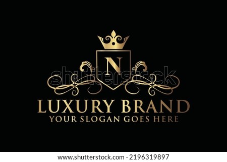 letter Initial N elegant luxury monogram logo or badge template with scrolls and royal crown, perfect for luxurious branding projects

