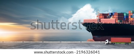 Containers cargo logistics import export transport concept, Big ship in the ocean and container truck at sunset dramatic sky background with copy space, Nautical vessel and sea freight shipping Royalty-Free Stock Photo #2196326041