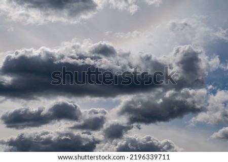 Dark cumulus clouds in the sky. Background picture.