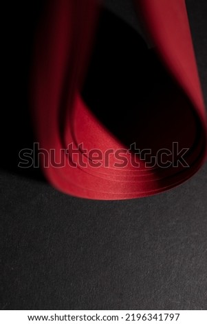 Red warping paper for decoration on black