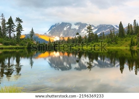 Mount Shuksan at sunset with reflection view from Picture Lake, Deming Washington.